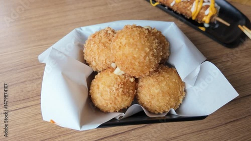 Fried Cheese Balls in Snack Tray, Crispy and Delicious Street Food Close-Up. High quality 4k footage