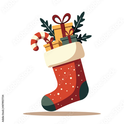 Christmas stocking filled with gifts, candy cane, and greenery  