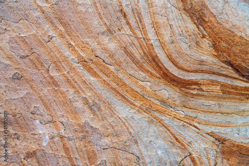 Close-up of weathered rock surface with layers.