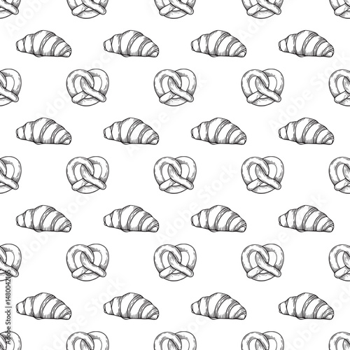 Seamless pattern with hand-drawn bakery products and wheat ears in vintage engraving style on a white background