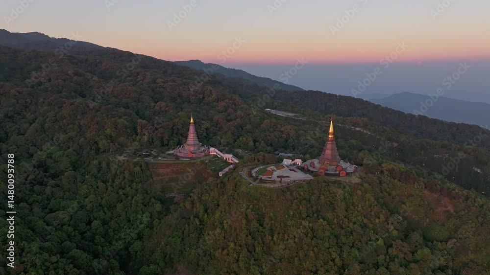 custom made wallpaper toronto digitalPagodas lit by warm sky in Doi Inthanon National Park, Thailand. Aerial drone video.