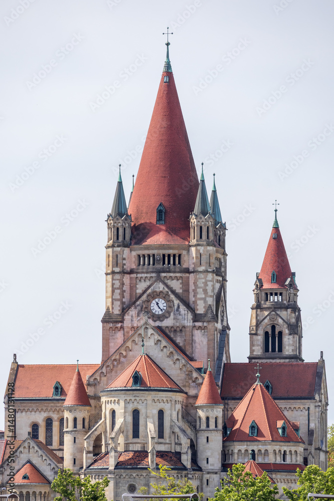 Fototapeta premium Detailed view of the striking neo-Romanesque St. Francis of Assisi Church, also known as the Kaiser Jubilee Church, located on Mexikoplatz in Vienna. 