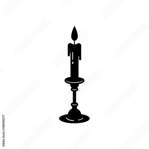 brass candlestick with wax drips on white 