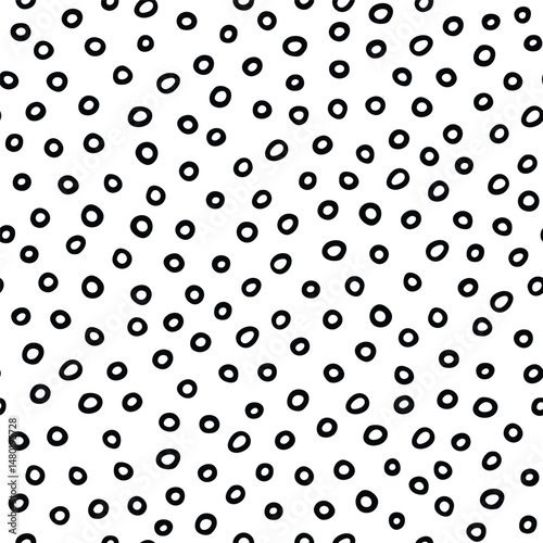Vector seamless polka dot pattern. Hand drawn circles texture background. Hand drawn ornament for wrapping paper. Geometric pattern for wrapping paper.