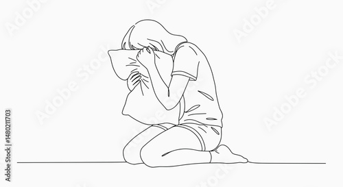 Sad girl hugging a pillow in a minimalist style on a white background - concept
