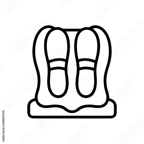 Wet boots on drying mat after outdoor activities or concept of children summer camp  
