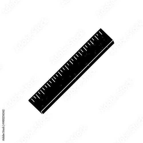 wooden ruler with faded markings on white 
