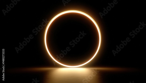 A bright, glowing ring forms an annular solar eclipse against a dark sky, creating a striking astronomical phenomenon. photo