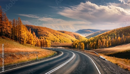 Scenic autumn road in Altai Siberia amid rolling hills and forested landscapes beauty