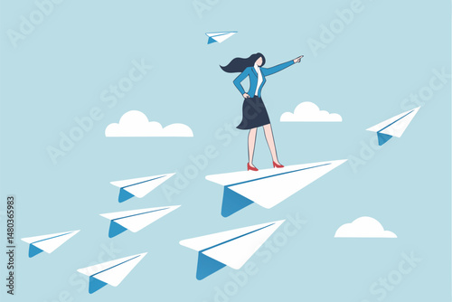 Business leadership, woman power to lead company to achieve target, smart confidence businesswoman standing on leading flying paper airplane origami pointing finger to the direction to reach goal.