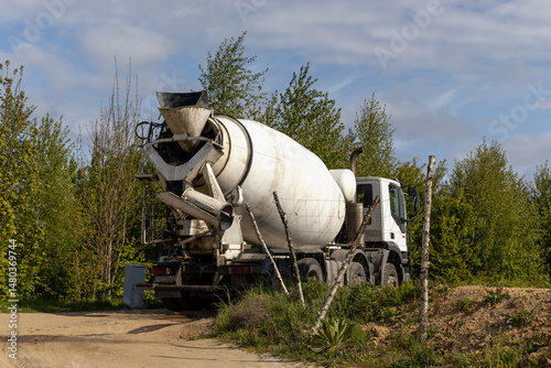 Mixer truck. Concrete pumping on building site