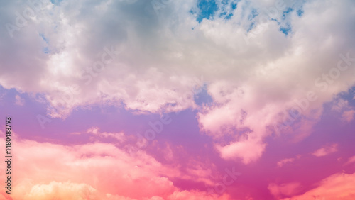 Sky with clouds and multicolor gradient in pink, purple, and blue tones, ideal for creative design and inspirational backgrounds.
