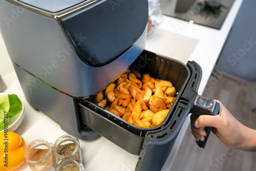 фотографія Air fryer machine in the kitchen