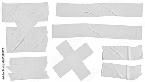 Different adhesive cloth tape pieces in various shapes are arranged on a white background