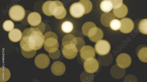 3D render loop video animation of Captivating golden bokeh lights studio photography dark background close-up view abstract art