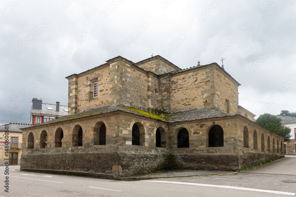 Fototapeta premium Collegiate Church of El Salvador in Grandas de Salime, Spain, showing arcades and stone walls