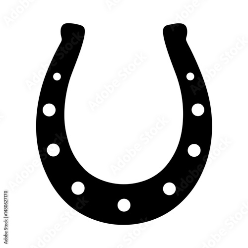 Black horseshoe with symmetrical holes, representing luck and positive energy