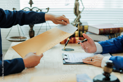 A client submits legal documents to an attorney, providing detailed case information for review and preparation of legal representation.