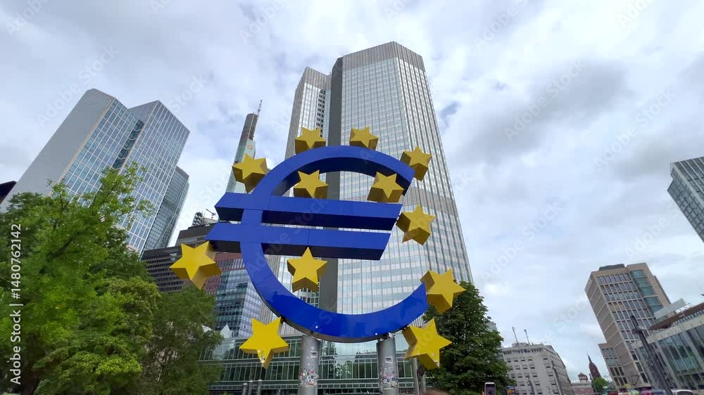 Euro symbol standing tall in frankfurt's financial district