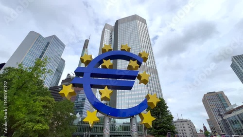Euro symbol standing tall in frankfurt's financial district