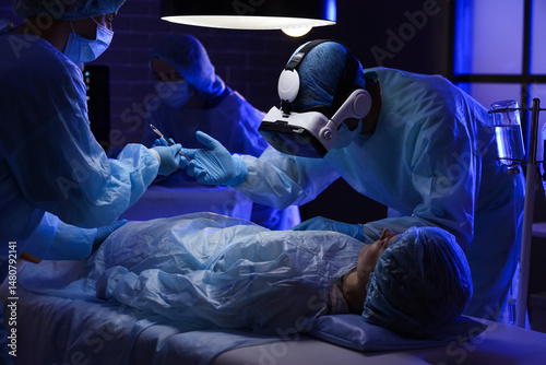 Doctors with VR glasses ope...