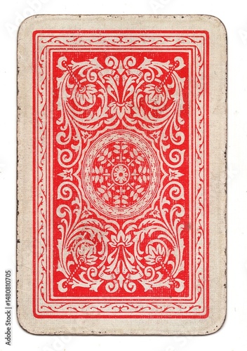 A red vintage playing card back isolated on a white background.