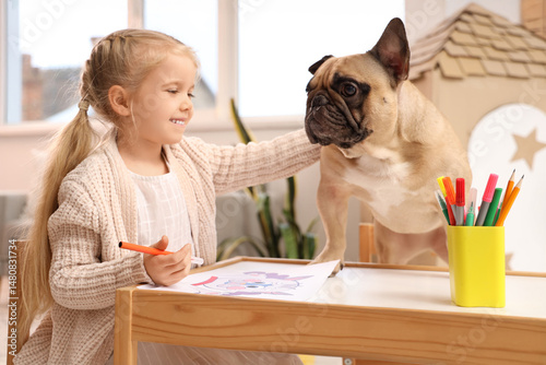 Cute happy little girl with...