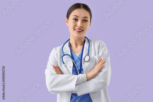 Female Asian doctor smiling...
