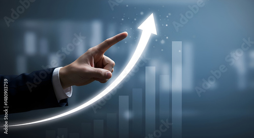 Success Concept: Businessman's Finger on Glowing Arrow & Bar Graph, Corporate Achievement & Vision photo