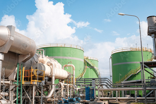 Demineralized water tank and multi effect desalination plant (MED) at industrial power plant. A thermal technology uses steam to produce distilate water from seawater photo
