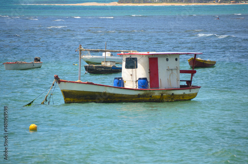Konstfotografi The fishing boats of the fishing village in Praia do Forte, Bahia, are symbols of tradition and culture