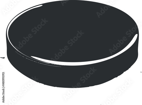 Close-up image of a black hockey puck used in ice hockey games and sports competitions