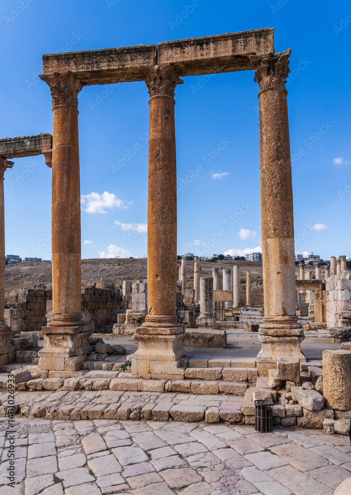 Columns line the Cardo Maximus or main street in Jerash, a Greco-Roman well preserved city in Jordan Columns line the Cardo Maximus or main street in Jerash, a Greco-Roman well preserved city in Jordan