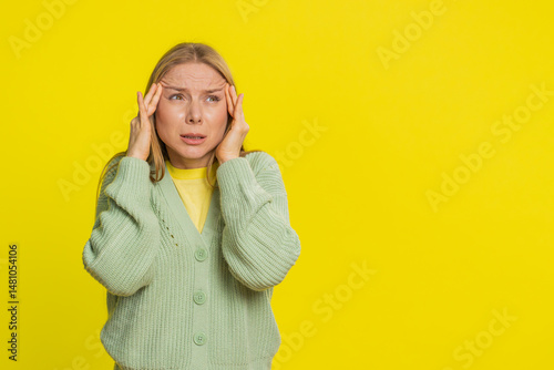Valokuva Displeased exhausted Caucasian middle-aged woman rubbing temples to cure headache problem suffering from tension migraine stress