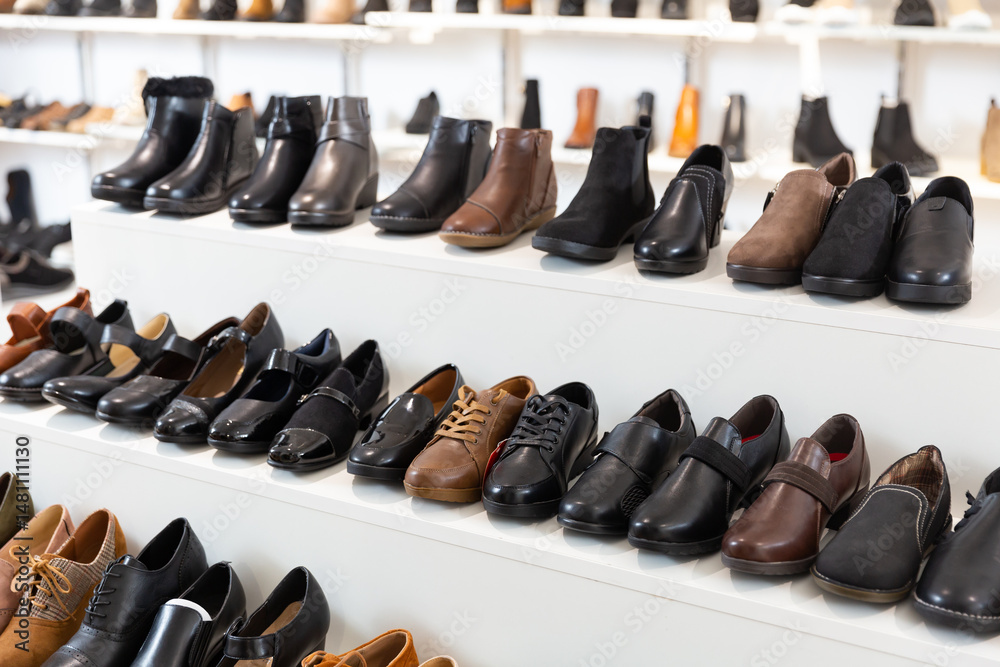 Showcase with casual stylish shoes in a modern store