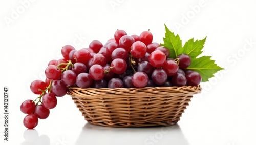 Fresh red grapes in a woven basket. photo
