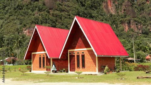 Wallpaper Mural On a sunny day, two modern minimalist style a frame villas adorn the green landscape of Harau Valley. Built for travelers and nature lovers who want comfort amidst the beauty of nature. Torontodigital.ca