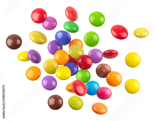 Colorful round candies scattered in the air.  A vibrant explosion of different colored chocolates