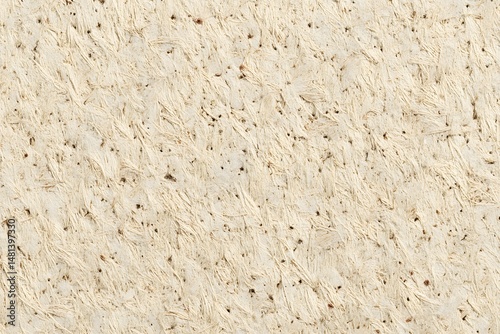 Textured Wood Chipboard: A macro shot of a wood chipboard, the organic texture adding tactile richness, ideal for design and conceptual applications.