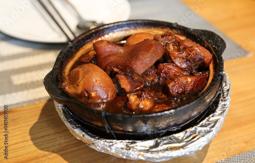 Braised pork trotters Chinese cuisine meat dish closeup view