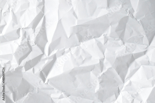 Crumpled white paper sheets texture background