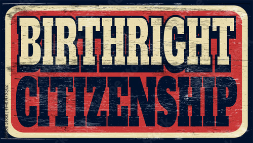 Aged and worn birthright citizenship sign on wood