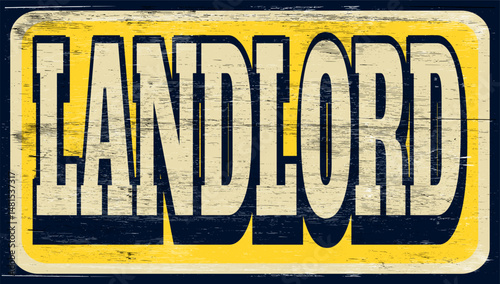 Aged vintage landlord sign on wood