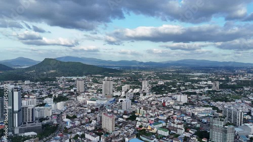 Aerial view of a vibrant city surrounded by industrial and commercial buildings. City life.