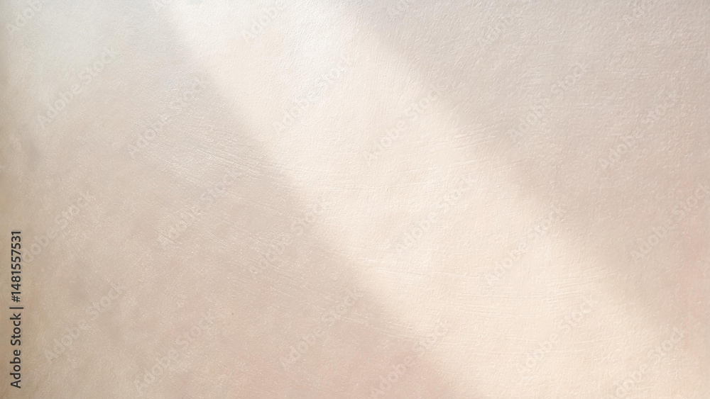 Naklejka premium 自然光が差し込むベージュの壁 美容 コスメ系背景テクスチャ 