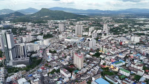 Aerial view of a vibrant city surrounded by industrial and commercial buildings. City life.