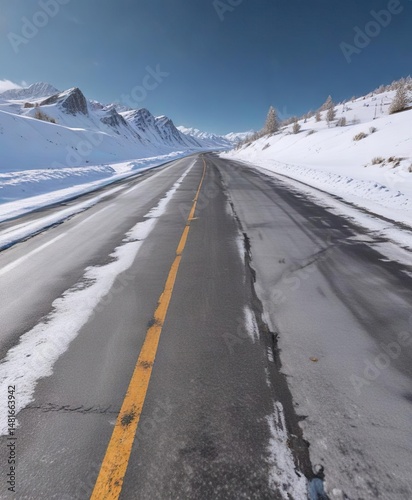 Snow covered road with clear pavement peeking through, vehicle safety, winter driving, snow clearing, winter tires