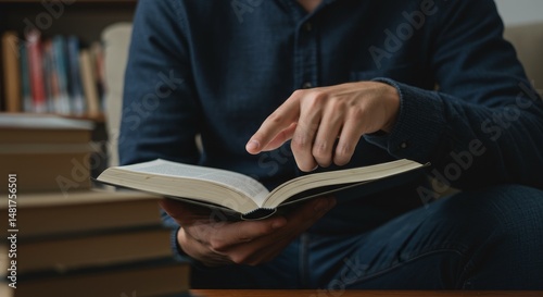 Photo of Man Reading Book i...