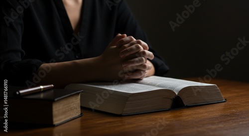 Photo of Praying Hands on B...