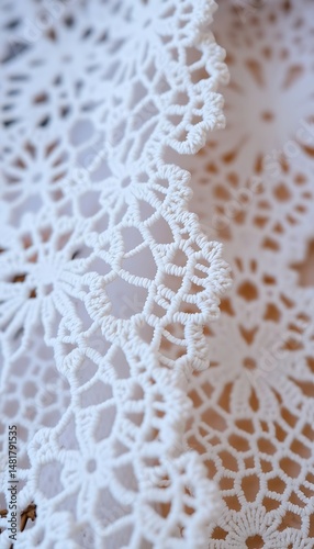 close up of a white doily on a table